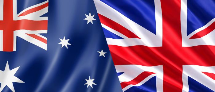 Australian and UK flags overlapping side by side.