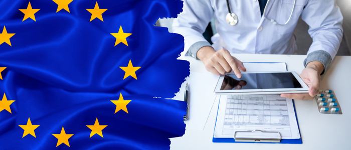 European Union flag beside a doctor using a tablet over medical documents and tablet blister packs. To represent that the EMA and Heads of Medicines Agencies strategy to 2028 prioritizes competitiveness, data, and AI in medicines.