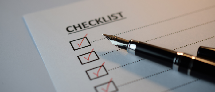 A pen resting on a document beside a calendar, representing the European Commission’s new Joint Clinical Assessment eligibility tool and updated early information guidance