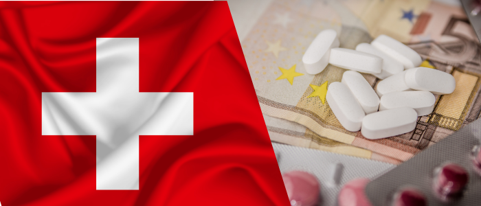 Swiss flag beside white tablets and blister packs scattered across euro banknotes.