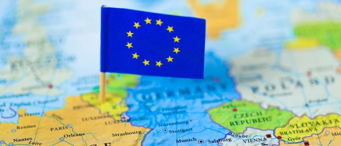Map of Europe with the European Union flag, representing the EU health technology assessment update on medical device Joint Clinical Assessments and the discontinued fourth medicinal-product assessment.