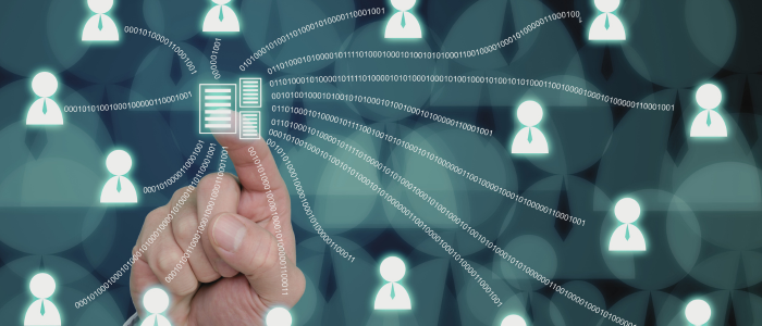 Hand selects digital data icon connected to user icons by binary code streams.