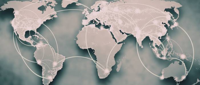 Glowing world map shows global network connections across continents.