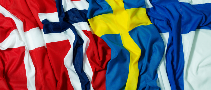 Denmark, Norway, Sweden, and Finland flags draped side by side with visible folds in the fabric.