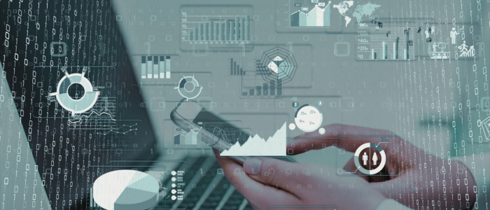 Hands using smartphone and laptop with overlaid data visuals, representing AI and real-world data use in healthcare diagnostics