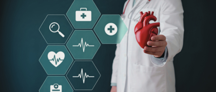 Clinician holding an anatomical heart model with digital healthcare icons, representing cardiac care and real-world data collection in atrial fibrillation.