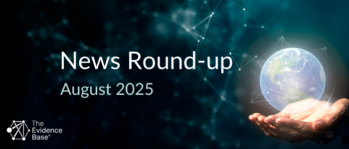 Hands hold a glowing digital Earth beside the text “News Round-up August 2025” on a dark tech-inspired background.