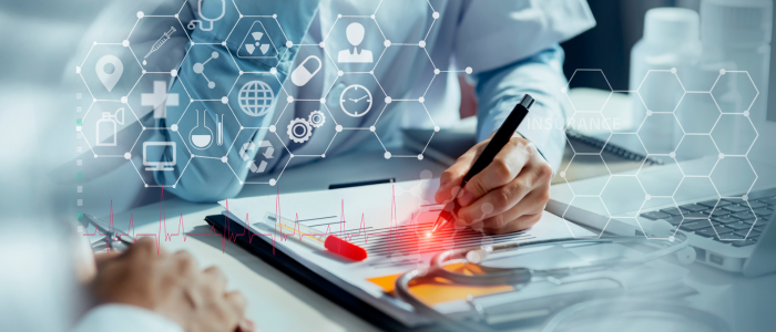 Doctor writes on a medical chart beside a stethoscope, with digital healthcare icons and data overlays above the desk.