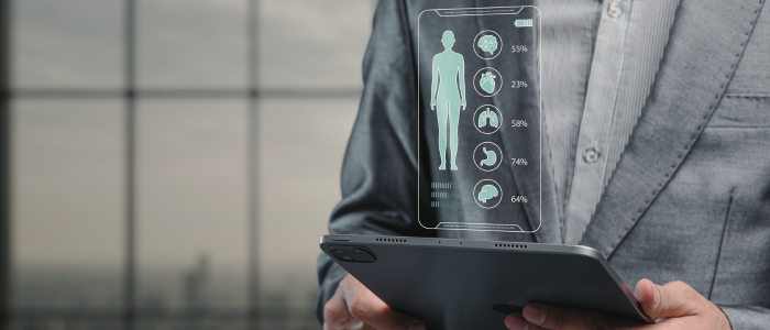 Tablet displaying digital health and patient data icons, symbolising real-world data use in healthcare regulation.