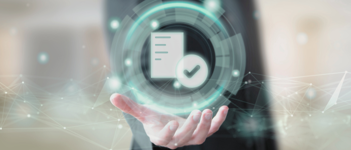 Hand holding a digital icon of a document with a checkmark, symbolizing FDA RWE submission approval.